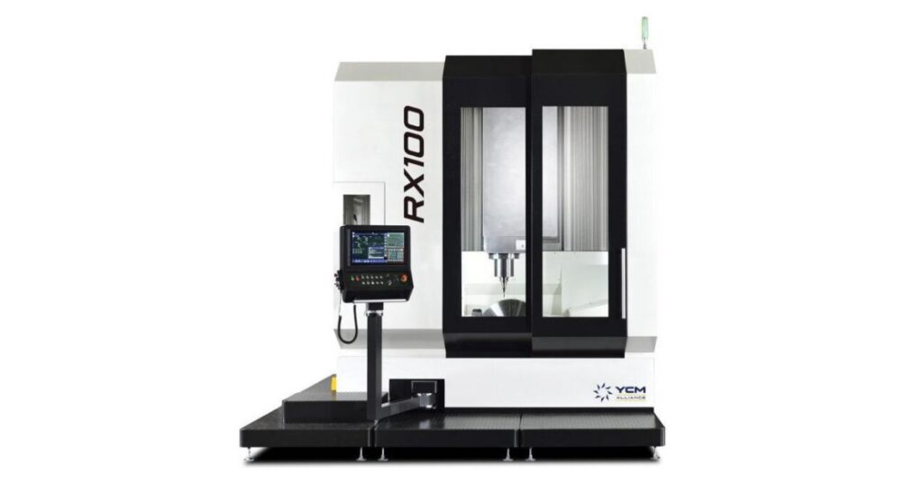 A white-and-black YCM Alliance 5-axis vertical machining center. The model number is displayed on the side as "RX100".