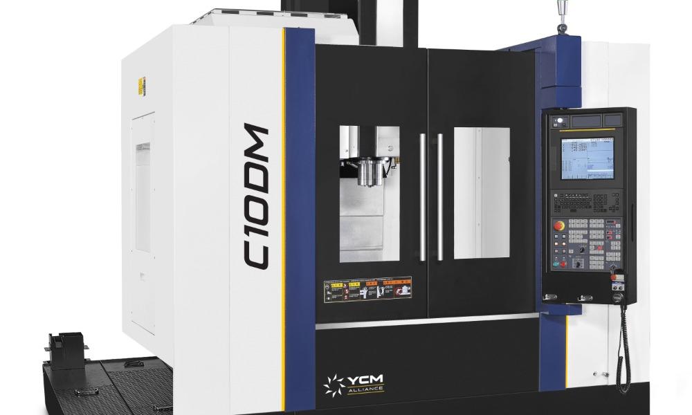 YCM C100M machining center with black doors and a side control panel. The white, blue, and black unit rests on a wide base.