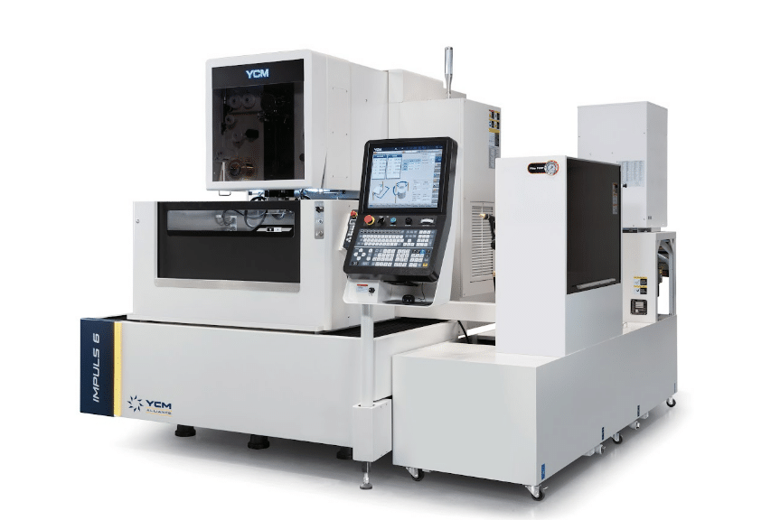 A light gray high-precision machine features a specific keyboard and screen on the side and a small rectangular window.