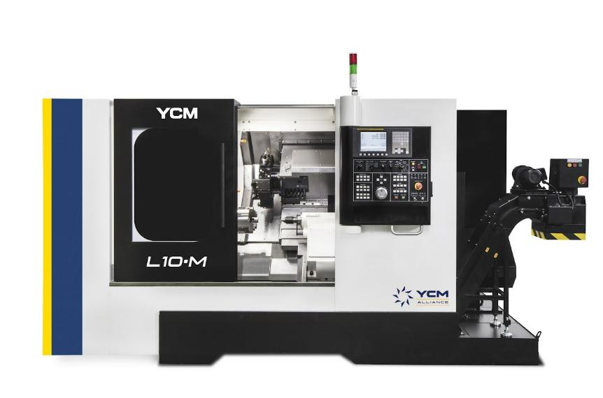 An oversized CNC machine features a vertical, rectangular window in the center and a console with several buttons.